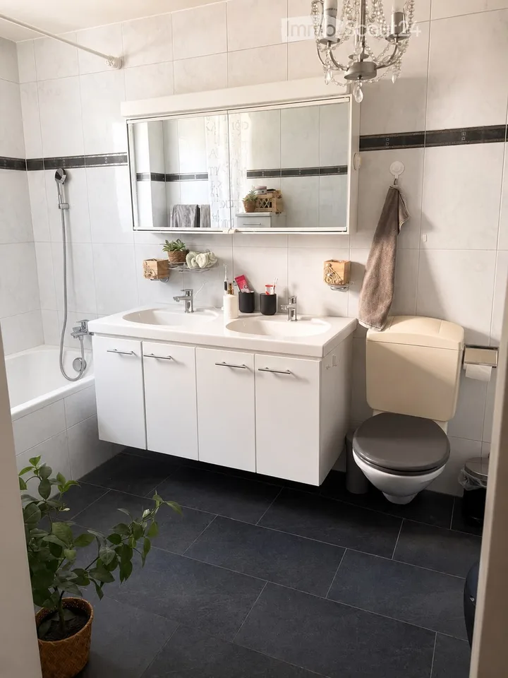 Charmante 4.5-Zimmer-Wohnung mit Gartensitzplatz an ruhiger Lage in Laufen – Foto 9 von 17