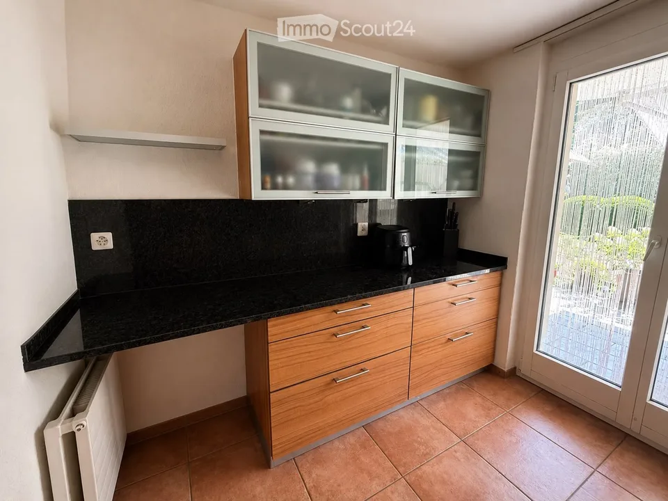 Charmante 4.5-Zimmer-Wohnung mit Gartensitzplatz an ruhiger Lage in Laufen – Foto 4 von 17