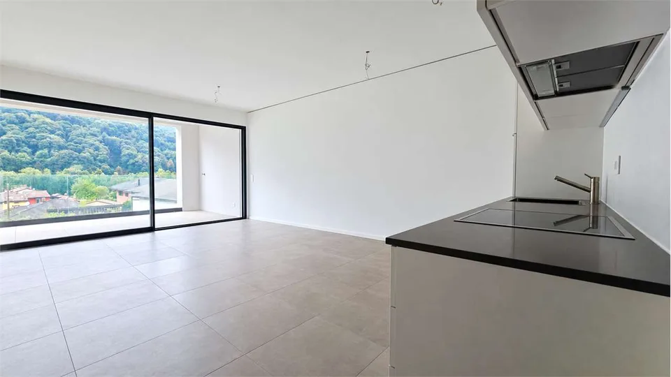 Modernes 2.5-Zimmer-Apartment mit Terrasse in der Residenza Due Laghi – Foto 3 von 13