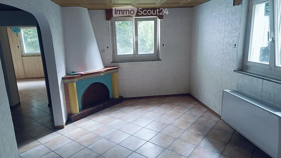 Maison bifamiliale avec jardin et bois – 1er étage rénové, rez-de-chaussée à valoriser – photo 7 sur 10