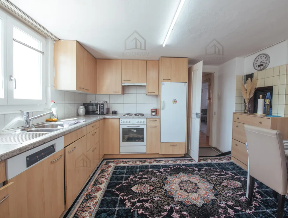 Piccola casa multifamiliare con spazio abitativo e commerciale – foto 9 di 11