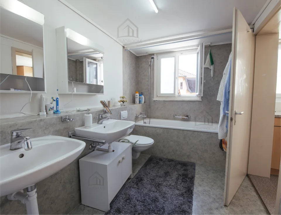 Piccola casa multifamiliare con spazio abitativo e commerciale – foto 10 di 11