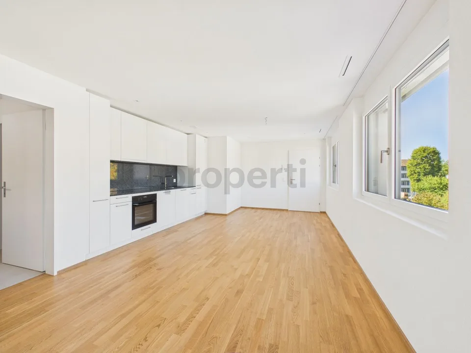 Sonniger Balkon, Minergie-Standard, Lift & Perfekte ÖV-Anbindung! – Foto 2 von 7