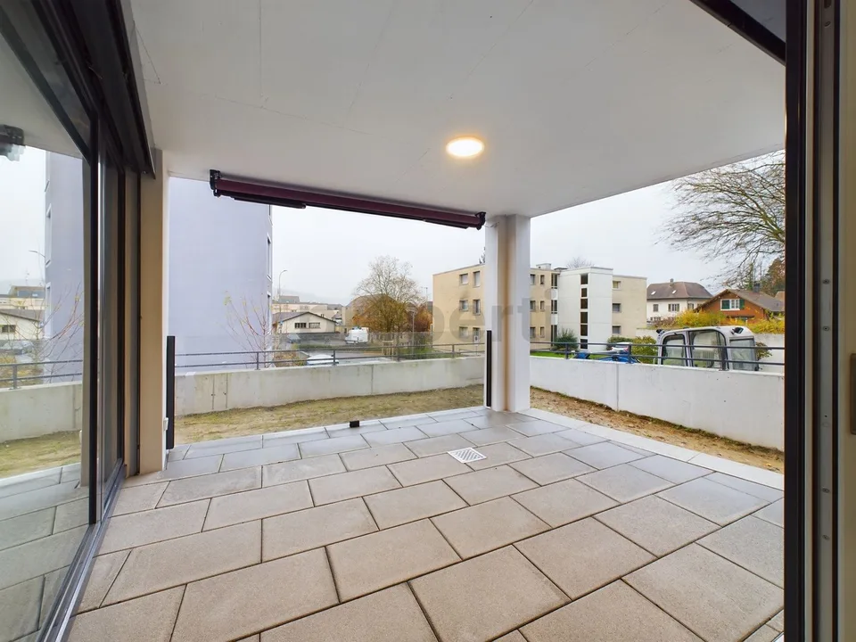 Moderne Kochinsel, Sitzplatz mit Garten & Minergie-Standard! – Foto 8 von 9