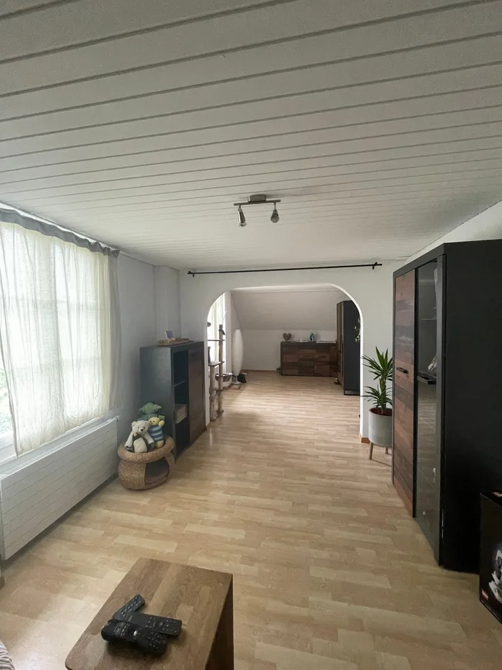 Charming attic apartment with spacious terrace – photo 5 of 9