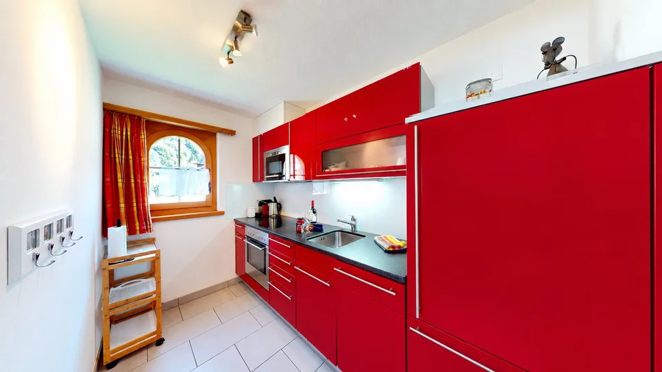 Appartement de 2,5 pièces stylé et entièrement meublé avec place assise dans le jardin à Klosters – photo 10 sur 14