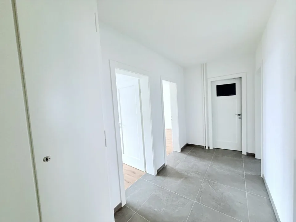 VISTA SUL LAGO E QUARTIERE PACIFICO: IL VOSTRO NUOVO APPARTAMENTO DI 3 LOCALI – foto 5 di 7