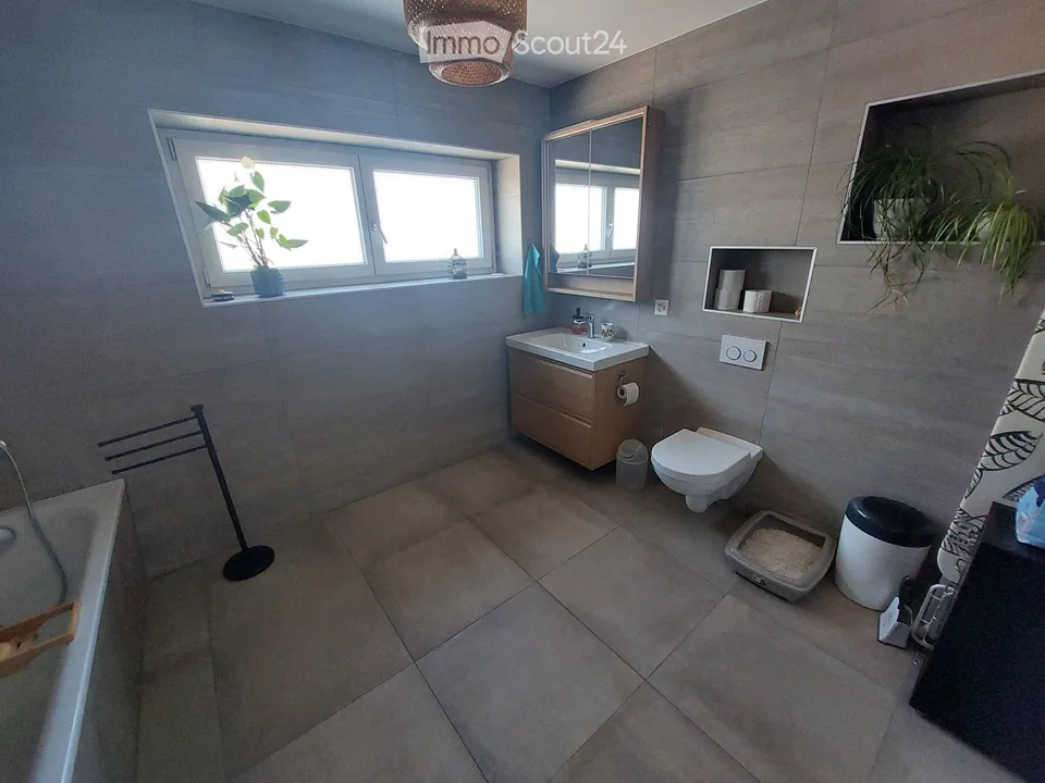 Appartement 4.5 pièces avec garage privatif et jardin commun – Foto 3 von 5