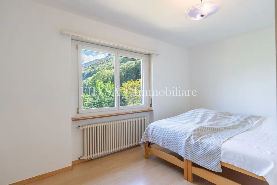 CONTONE - Einfamilienhaus inmitten von viel Grün mit grossem Grundstück – Foto 7 von 11