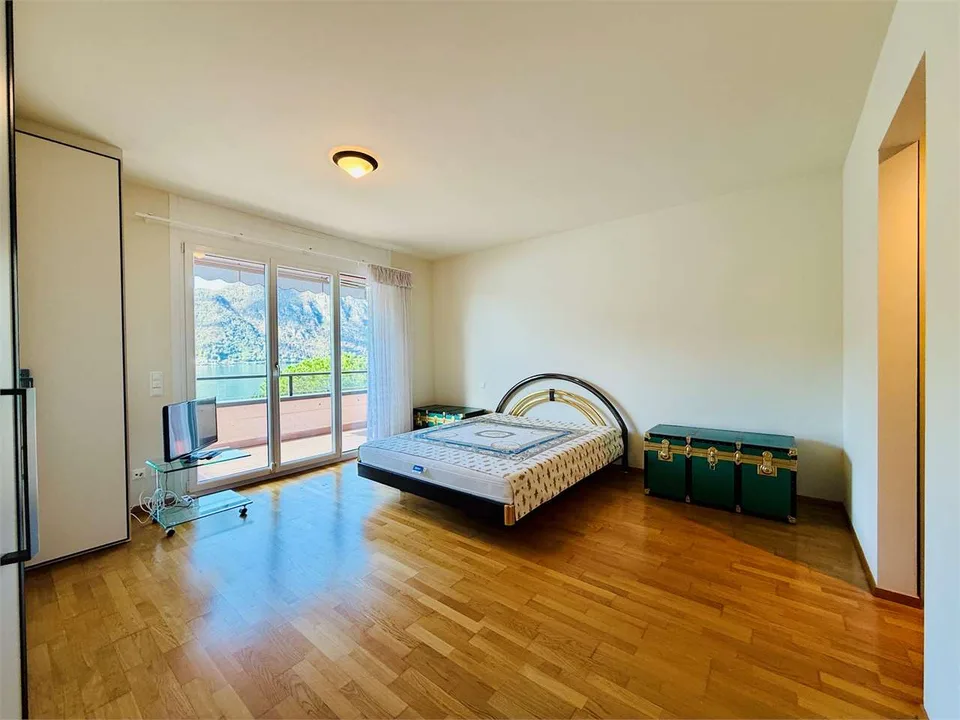 BISSONE - Geräumige 3.5-Zimmer-Wohnung mit herrlicher Seesicht, beheiztem Pool – Foto 9 von 13