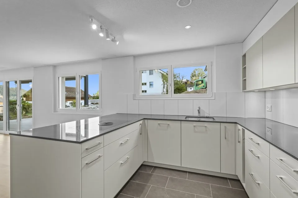 Appartement 4.5 pièces au rez-de-chaussée avec jardin – photo 4 sur 12