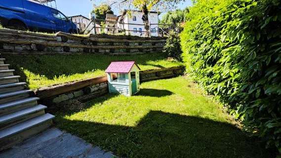 Maison 5,5 pièces en phase de rénovation avec cheminée et terrasse. – photo 14 sur 17