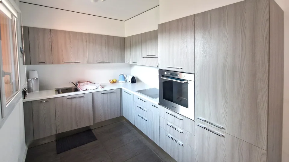Nouveau 3,5 pièces dans un quartier calme de Pedrinate avec deux terrasses – photo 4 sur 11
