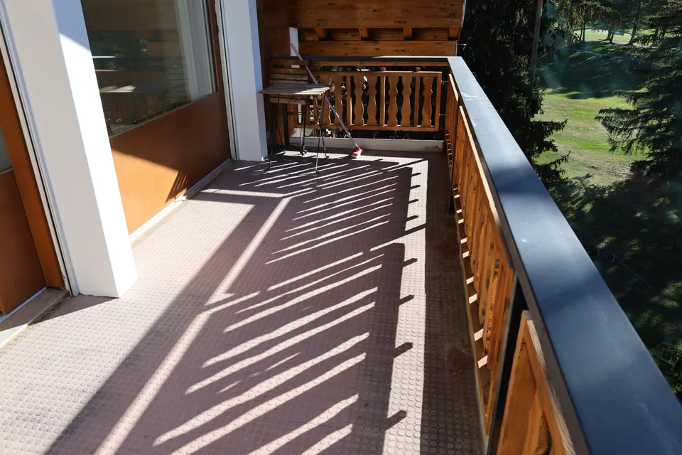 Appartement de 3.5 pièces avec vue et balcon – photo 4 sur 21