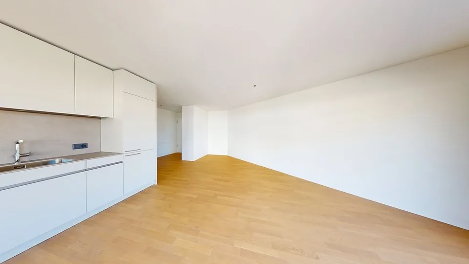 Moderne 2.5-Zimmer-Neubauwohnung mit eigenem Waschturm – Foto 3 von 4