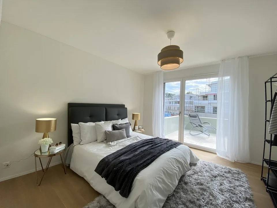 Moderne 2.5-Zimmer-Neubauwohnung mit eigenem Waschturm – Foto 2 von 4