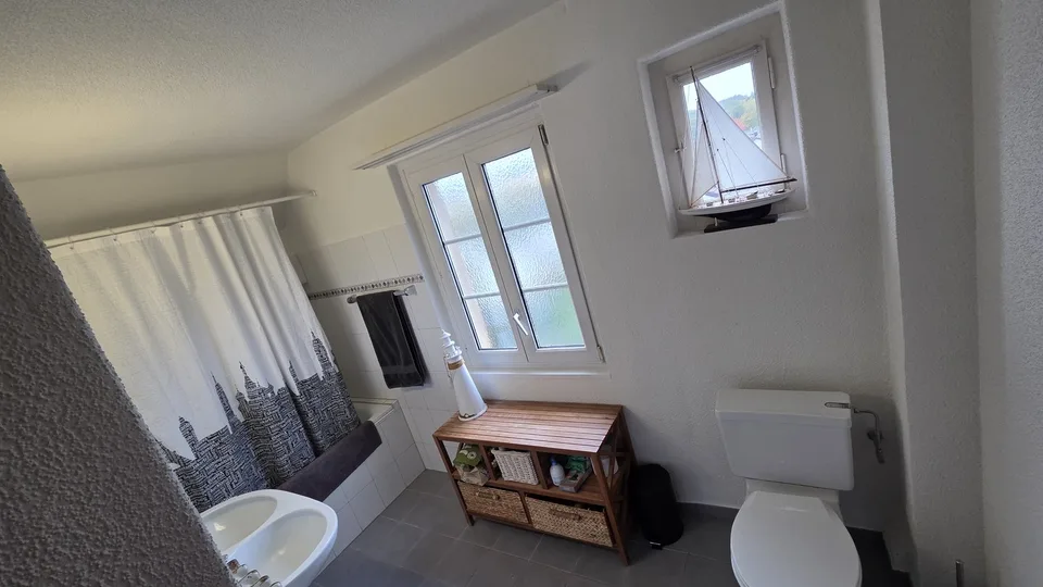 Exklusive 4-Zimmer-Attikawohnung mit traumhafter Aussicht über Adliswil und die Albiskette – Foto 12 von 13