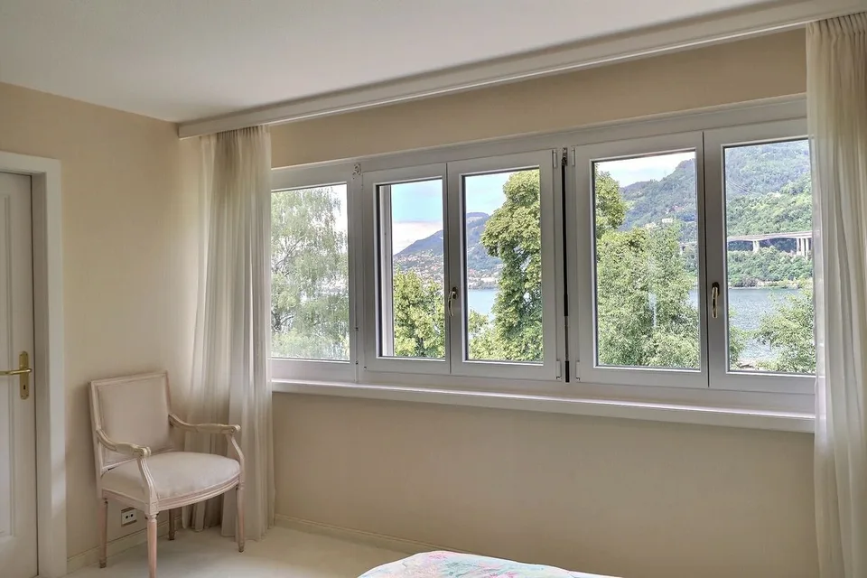 JOLI APPARTEMENT DE 4,5 PIECES AU BORD DU LAC AVEC TRES BELLE VUE PANORAMIQUE – photo 5 sur 24