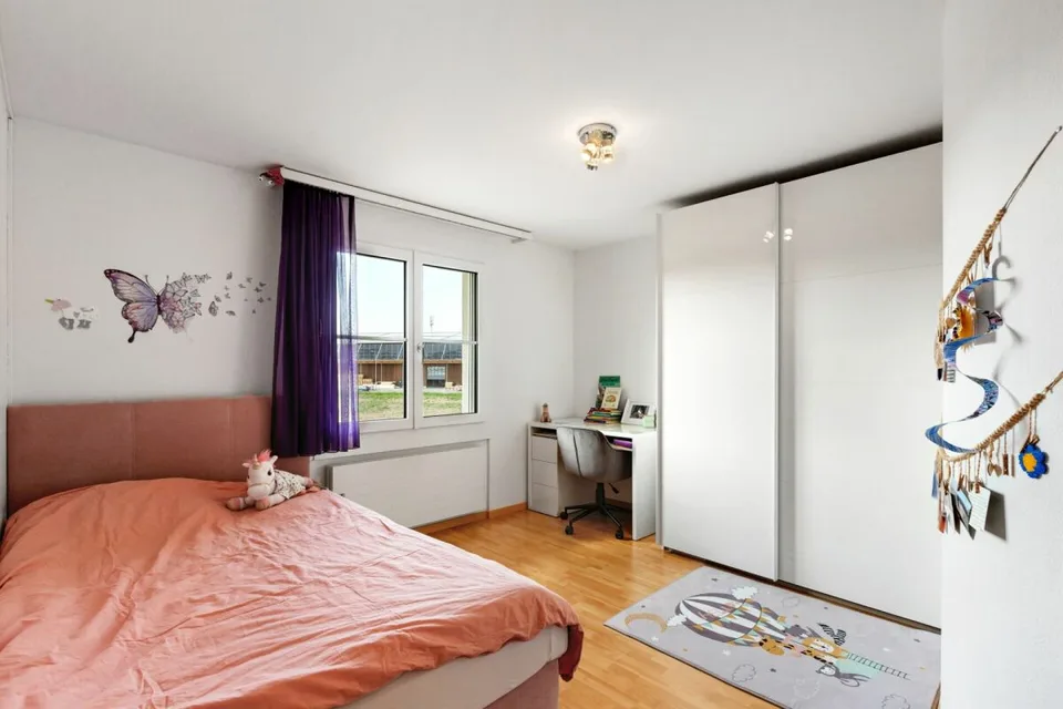 Appartement en duplex de 5,5 pièces dans un emplacement familial – photo 12 sur 17
