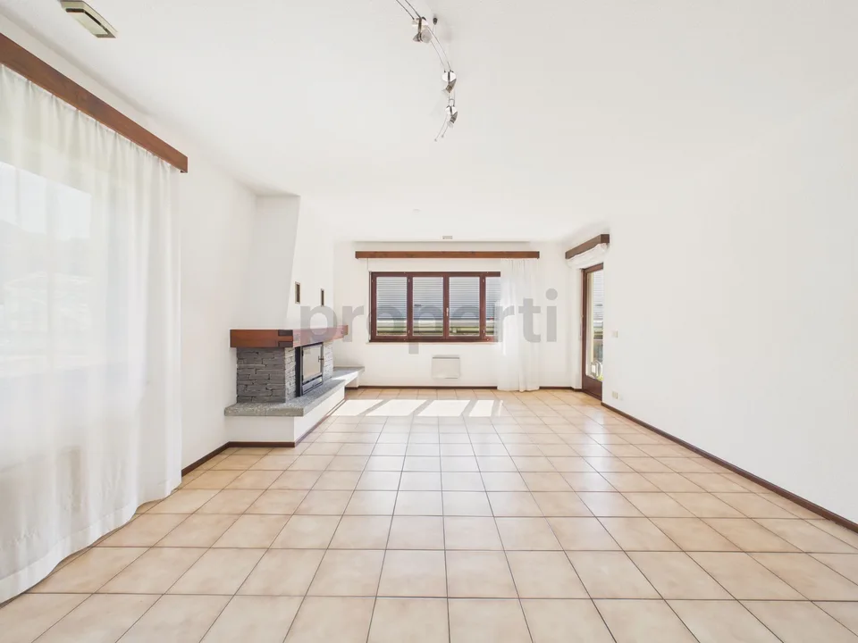 Appartamento 4,5 locali con box auto in casa bifamiliare