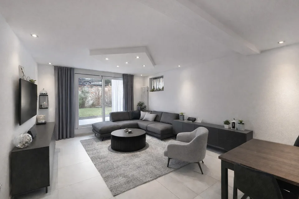 Casa bifamiliare con giardino a Canobbio