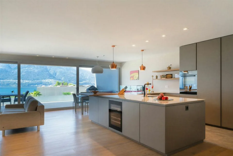 Lussuoso appartamento di 3,5 locali con vista lago, 2 ampie terrazze solarium, piscina e area benessere