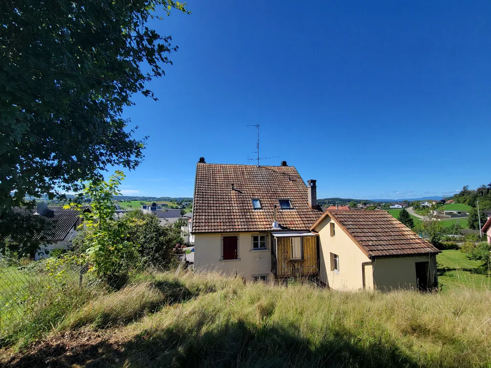 Opportunity: Small Income Building + Buildable Plot with Villa Plans Available