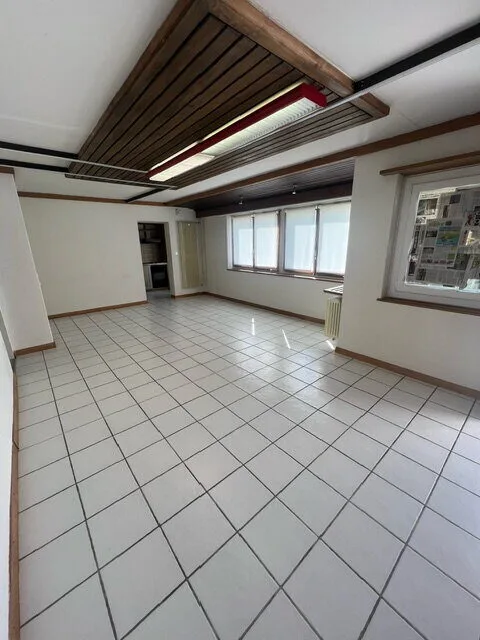 Local commercial de ~52 m2 au rez-de-chaussée à louer à Courtételle