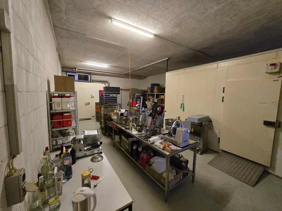 Fully equipped butcher shop with sales area and storage space