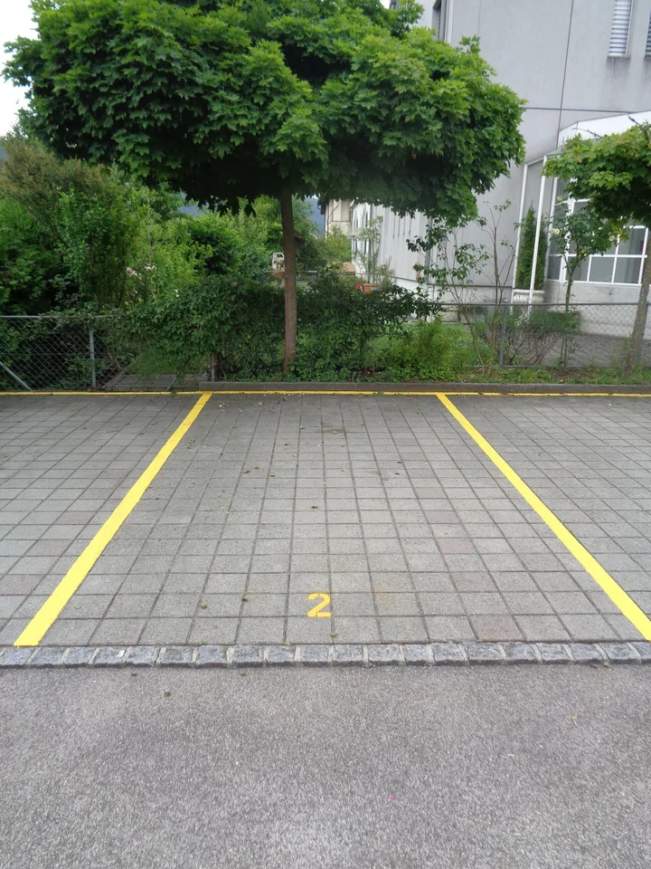 Parking extérieur dans la ville de Delémont à louer