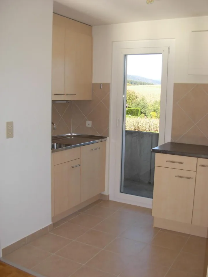 Wohnung mit 4 Zimmern, Balkon und Garage in Val-de-Ruz