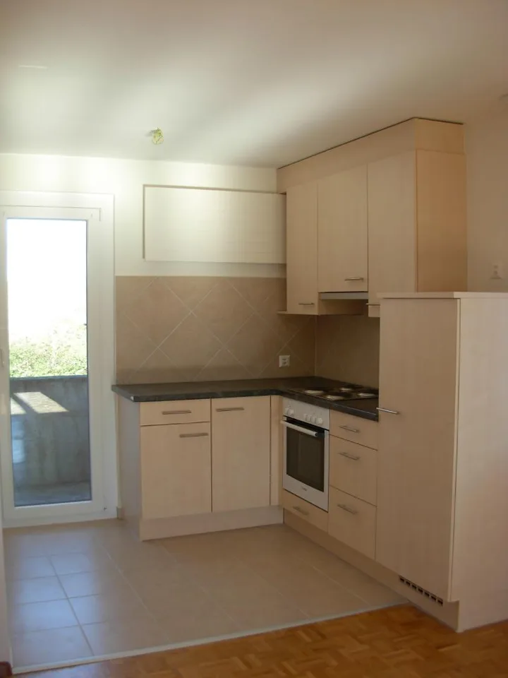 Wohnung mit 4 Zimmern, Balkon und Garage in Val-de-Ruz
