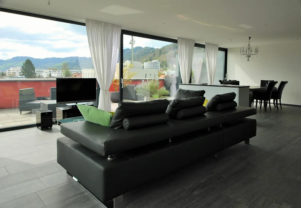 Appartement penthouse exclusif avec grande terrasse et vue imprenable sur les montagnes