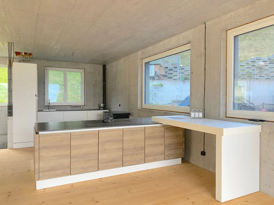 Maison de designer avec vue sur le lac et panorama alpin