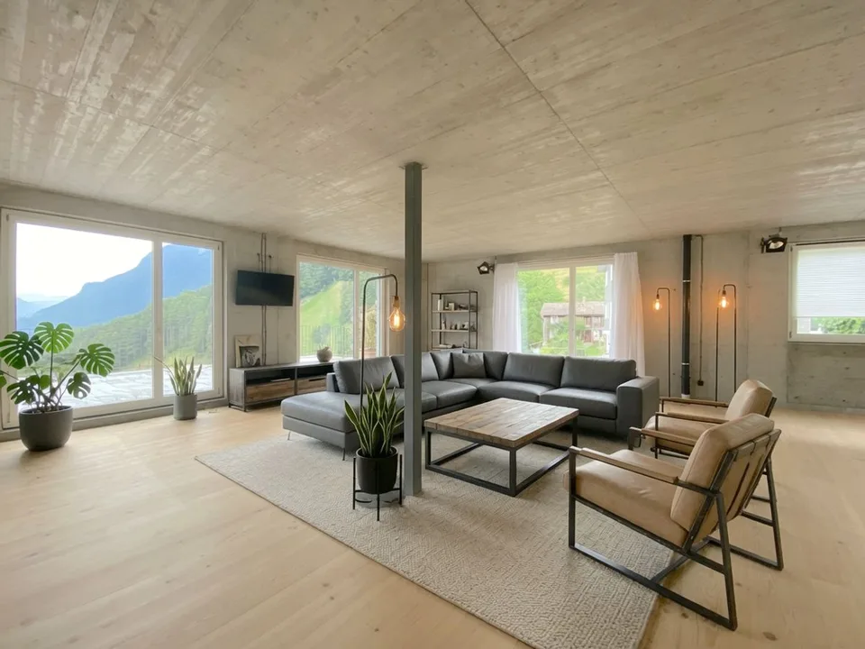 Maison de designer avec vue sur le lac et panorama alpin