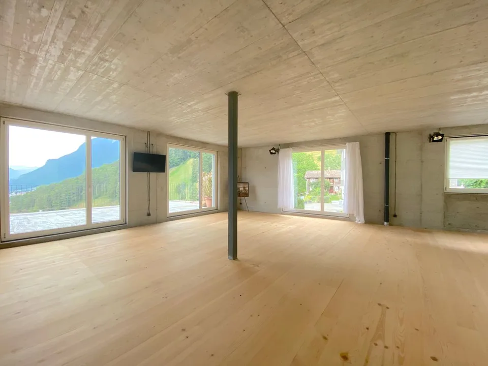 Maison de designer avec vue sur le lac et panorama alpin