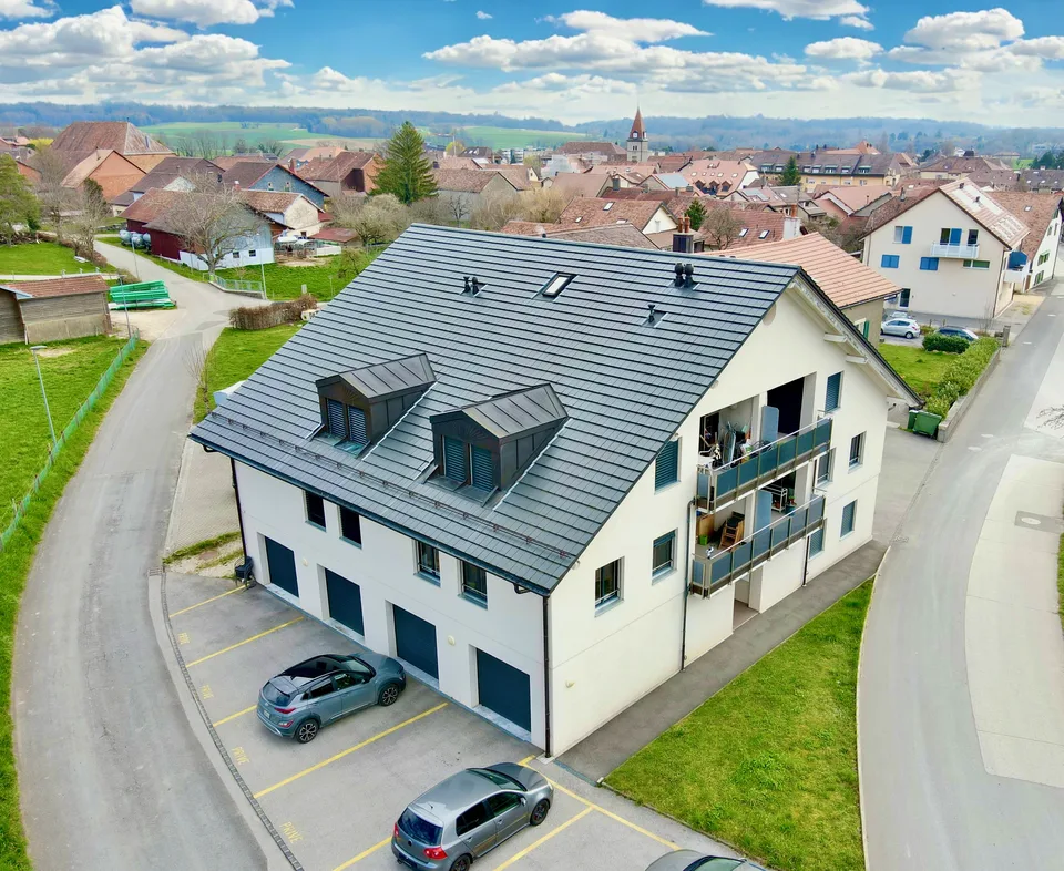 Immeuble résidentiel moderne de 6 logements au coeur du village