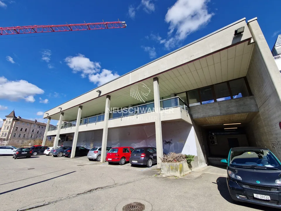 Immeuble de rendement mixte et 19 parkings à Delémont à vendre