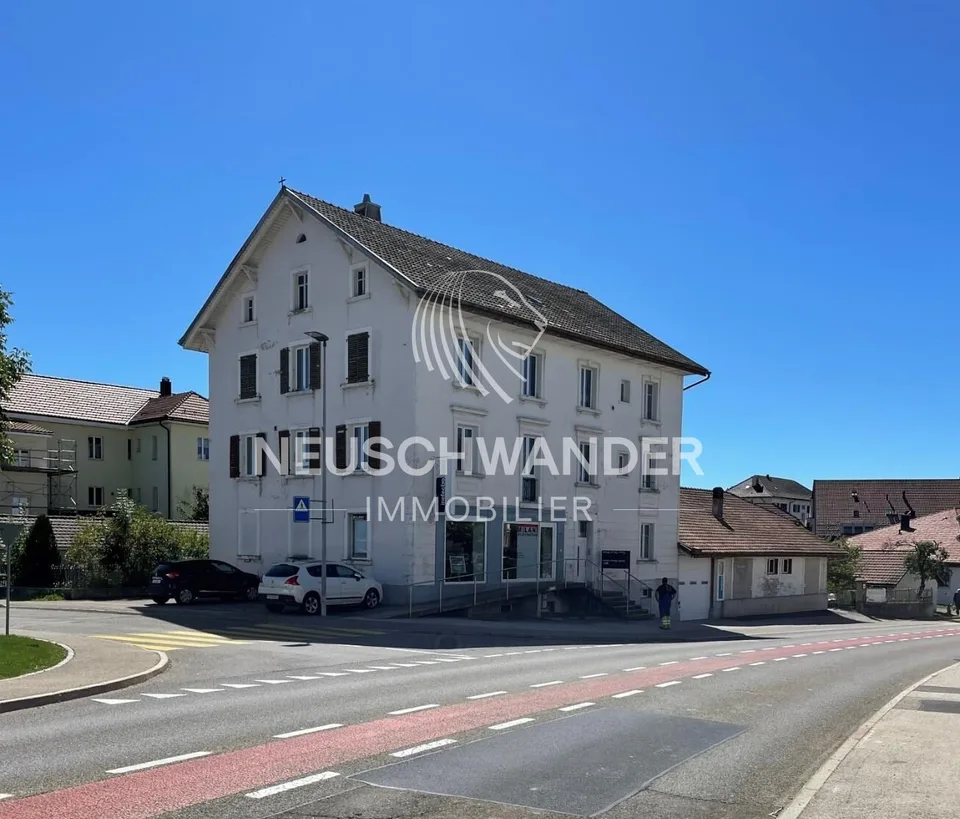 Immeuble de 4 logements et 3 commerces à vendre à Saignelégier