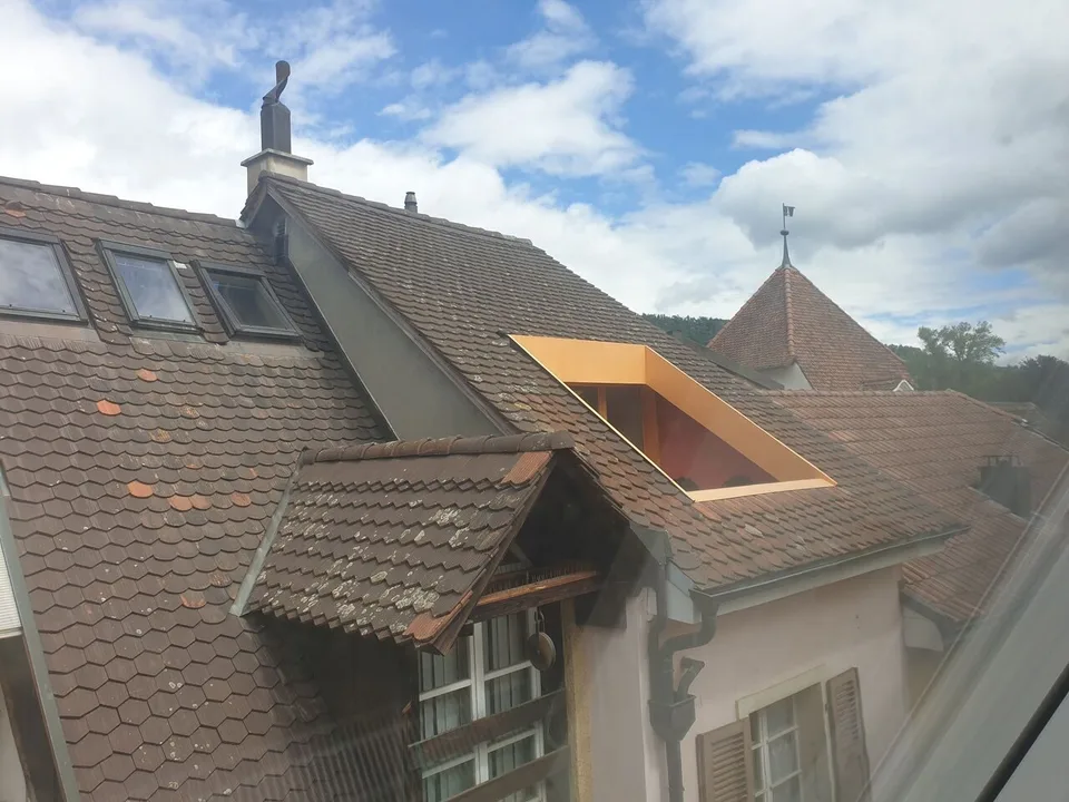 Zu verkaufen Gebäude mit 4 Wohnungen und 1 Geschäft in Delémont