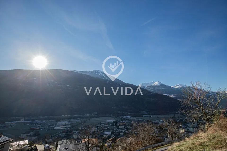 Sunny building land with project in Steg