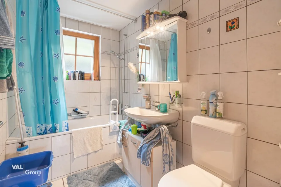 Ampia casa plurifamiliare nel verde – foto 10 di 13