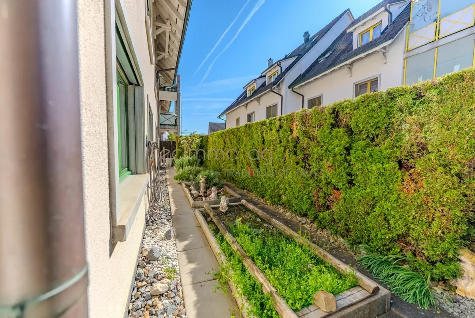 Appartamento giardino esclusivo di 4,5 stanze con ampio spazio esterno – foto 11 di 13