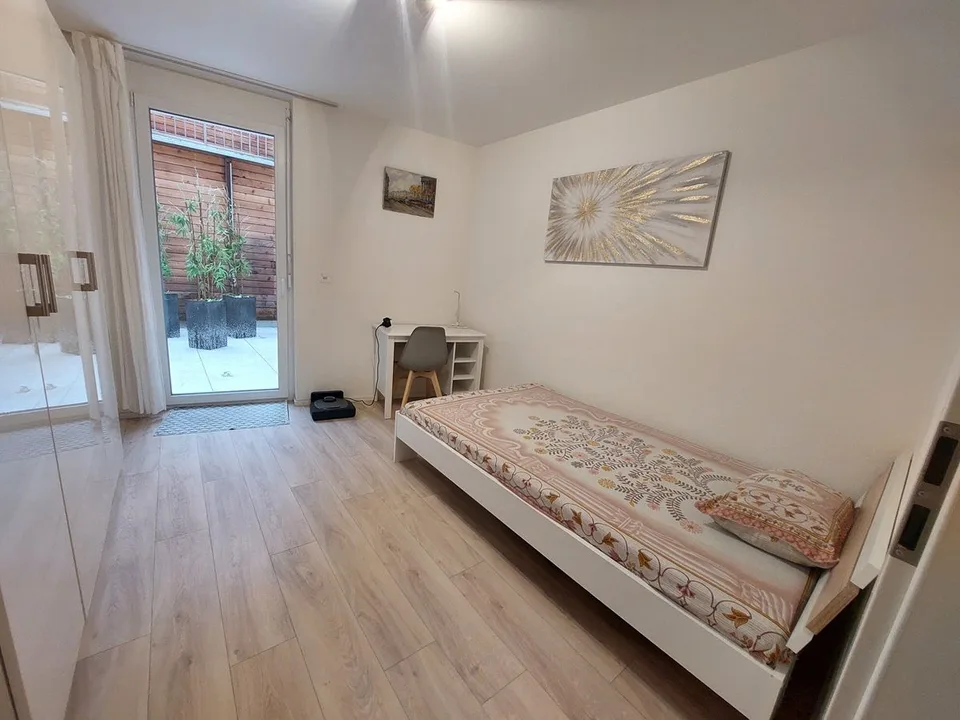 Appartamento moderno di 3,5 locali con terrazza e garage
