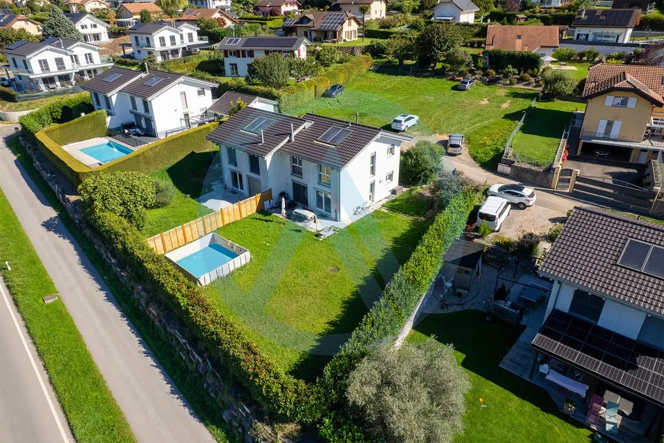 Belle villa jumelle à Ollon avec grand jardin plat et vue sur les Dents-du-Midi