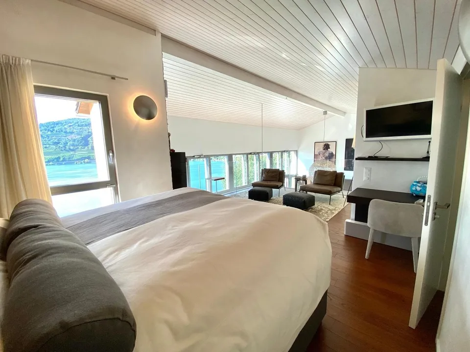 Casa moderna e spaziosa con vista mozzafiato sul lago – foto 6 di 13