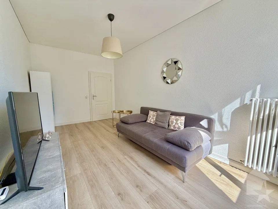 Appartement de 2.5 pièces rénové avec garage box !