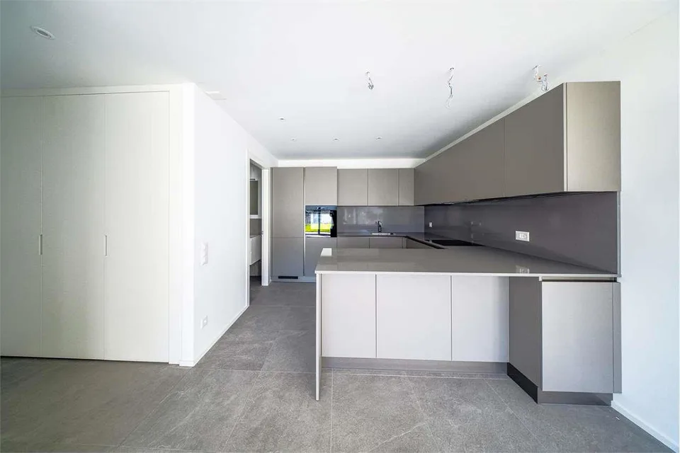 3.5 con giardino NUOVO Minusio vista lago al PT – foto 8 di 13