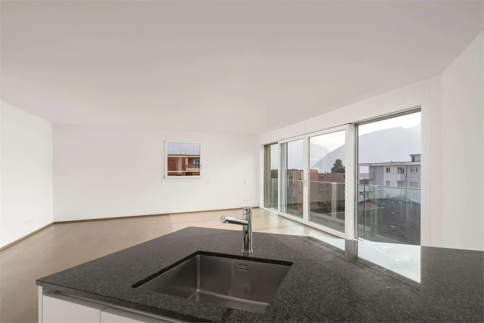 Melide - appartamento moderno di 4,5 locali con vista lago e giardino sul tetto