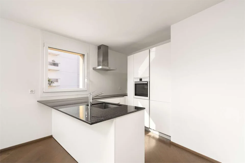 Melide - appartamento moderno di 4,5 locali con vista lago e giardino sul tetto